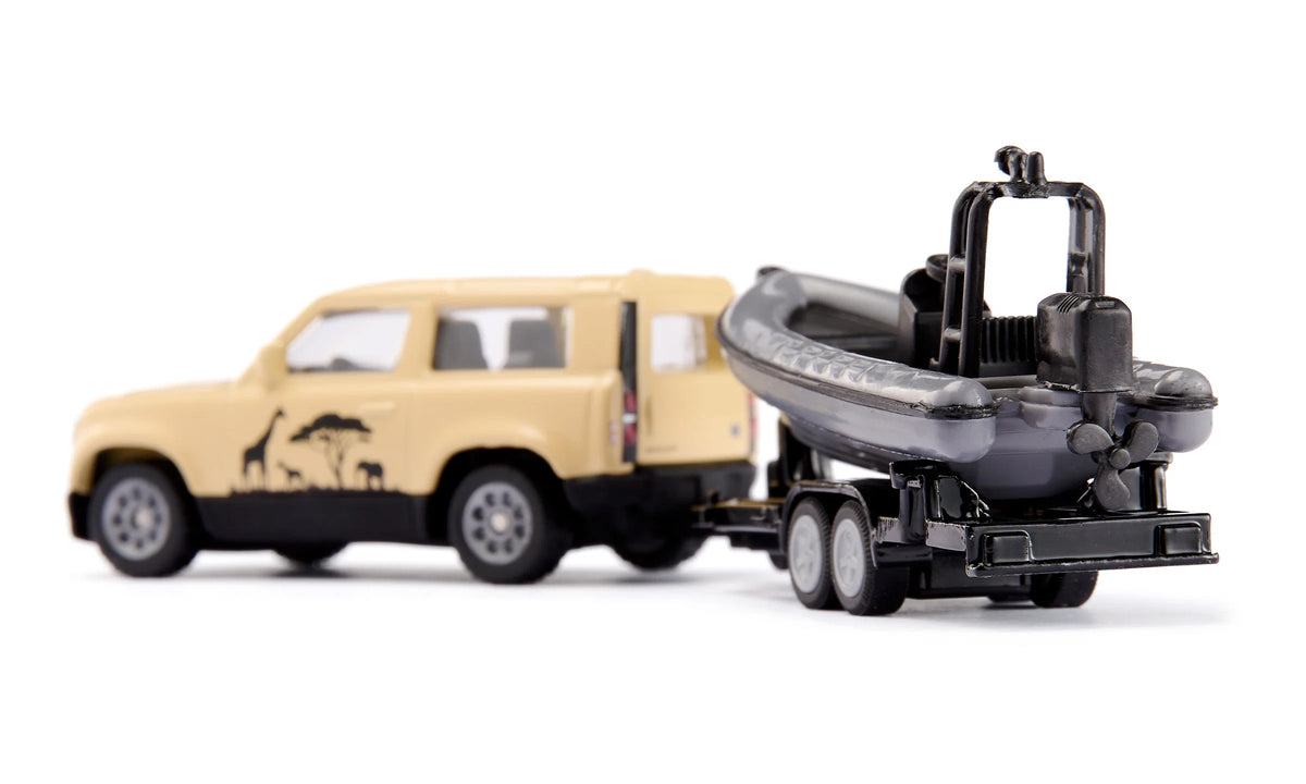 Siku 1:87  Land Rover Defender “Safari” With Boat
