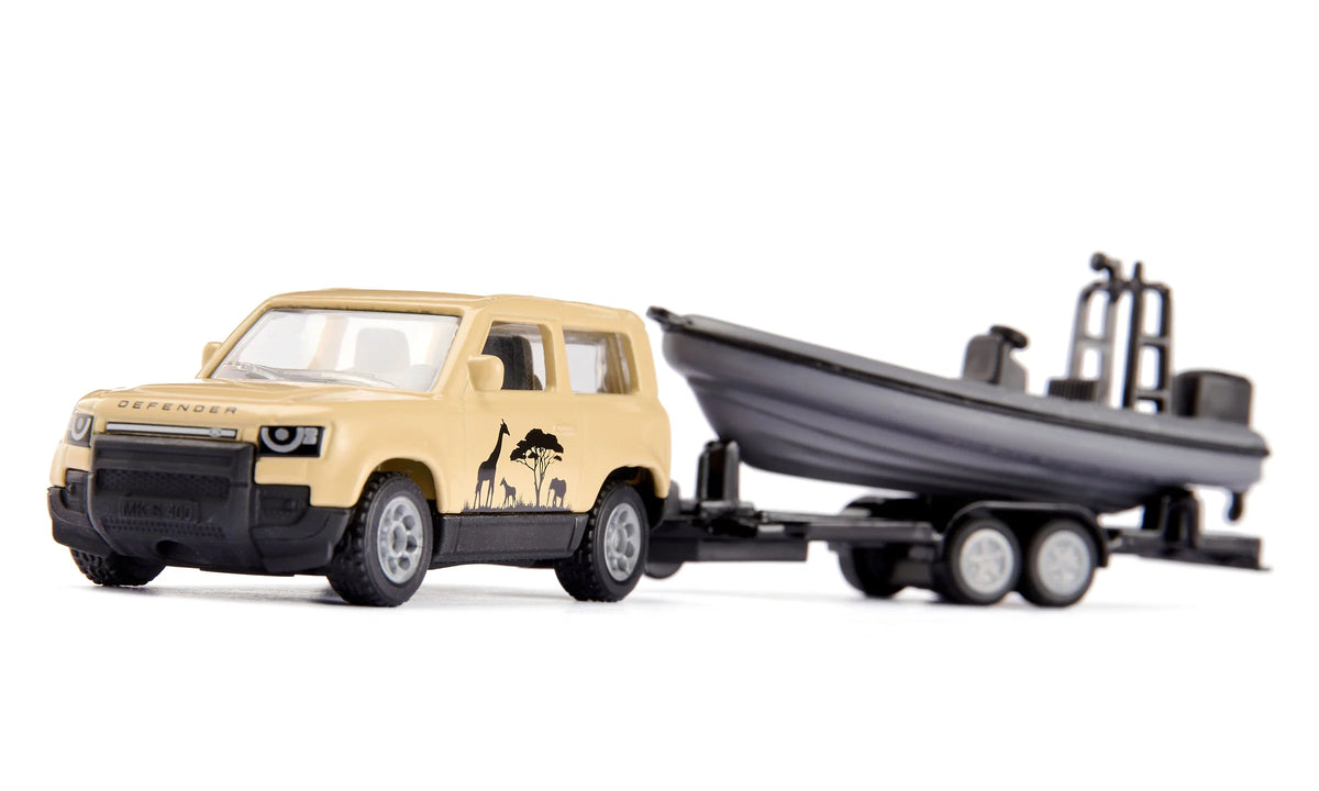 Siku 1:87  Land Rover Defender “Safari” With Boat