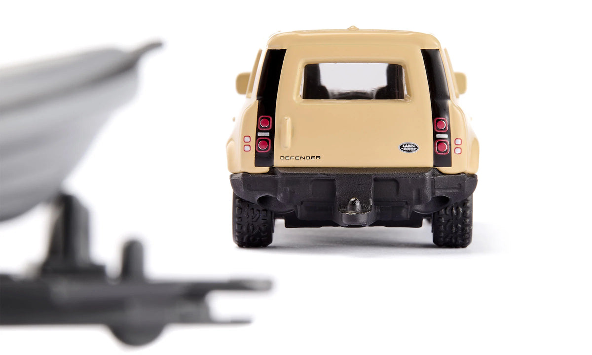Siku 1:87  Land Rover Defender “Safari” With Boat